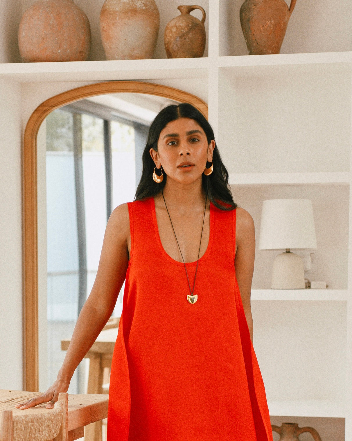 Monikh Dale x Daphine Vol. II. Monikh wears the Rochelle Gold Plated Earrings and Singh Gold Plated Pendant Necklace.